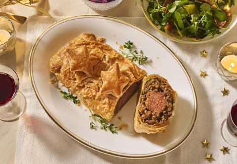A pastry wellington with pea and mushroom protein joint inside