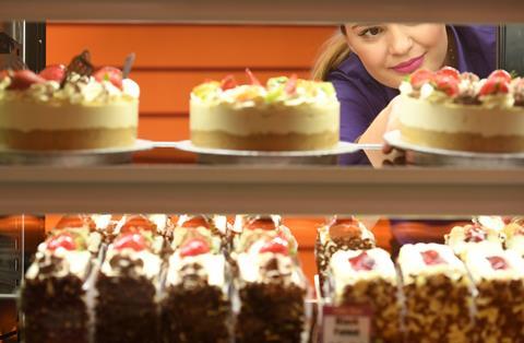 A selection of Cake Box's fresh cream cakes in a display cabinet