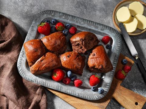 Tesco tear and share chocolate and caramel brioche in a baking dish with fresh strawberries and blueberries