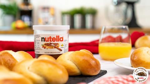 A jar of Nutella next to some brioche buns made from the home baking kit