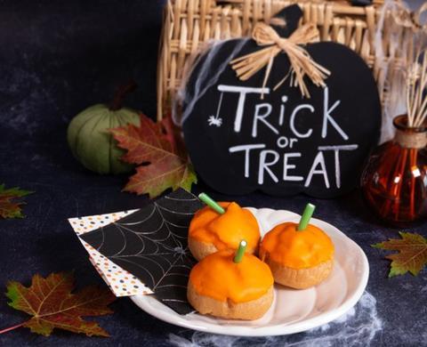 Mini Pumpkin Puffs next to a trick or treat sign