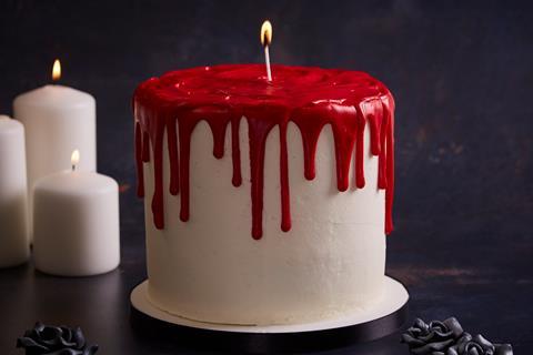 A cake that looks like a giant bleeding candle