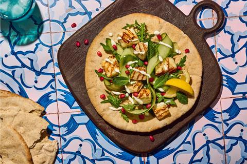 Deli Kitchen's new Lebanese Style Flatbread topped with grilled halloumi, cucumber, rocket, mint and pomegranate  2100x1400