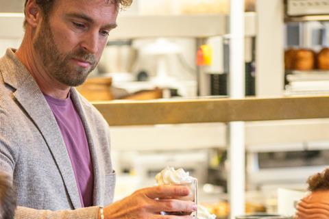 Lavazza - Lavazza's head of training David Cutler-Colclough hands out La Barbajada coffees during the 'Bakery Reimagined' event