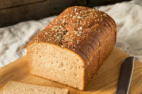 Sliced wholemeal bread on a chopping board